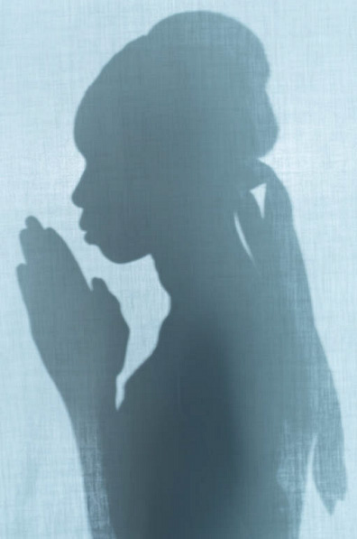 Praying woman.